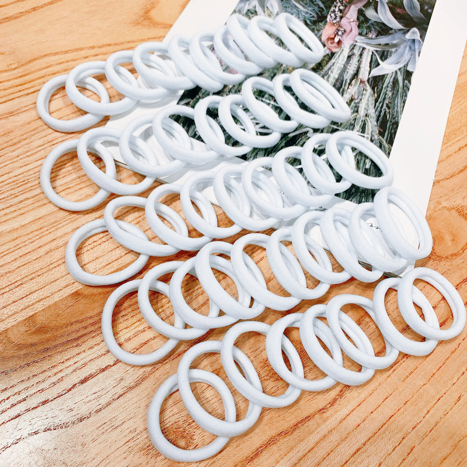 50/100 pieces of black and white hair bands