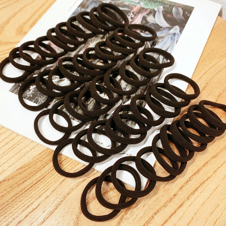 50/100 pieces of black and white hair bands